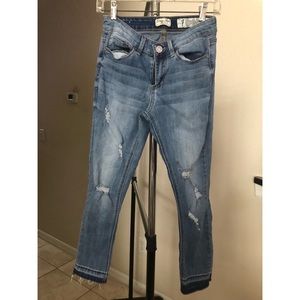 Medium wash ripped jeans from Macy’s.